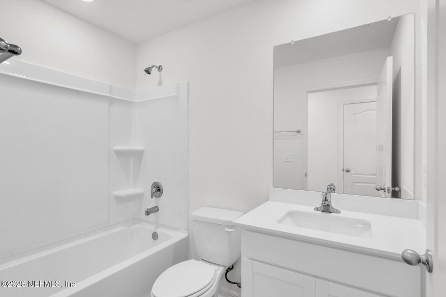 Furnished interior view inside a new home in Rolling Hills, Green Cove Springs (Image 11).