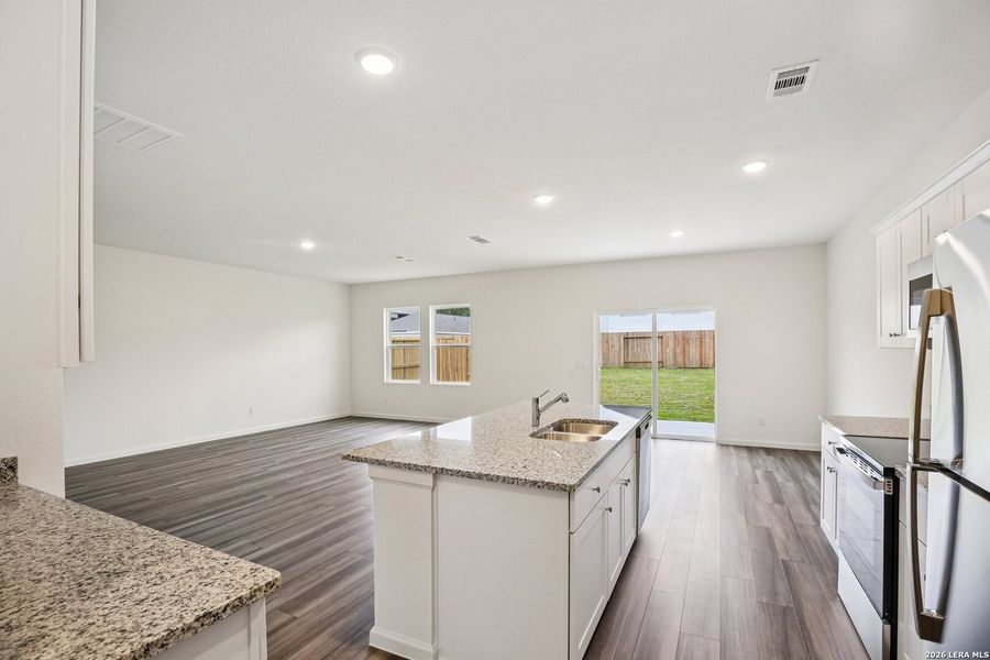 Furnished interior view inside a new home in Roosevelt Heights, San Antonio (Image 4).