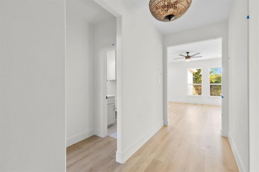 Hallway featuring light wood-type flooring