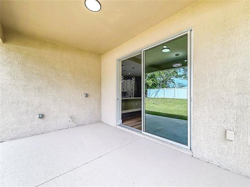 Exterior details and patio area of a home in , Citrus Springs (Image 4).