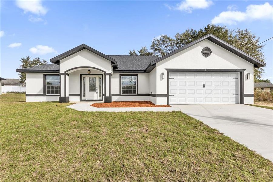 Front exterior of a new home in , Ocala, FL, highlighting curb appeal (Image 1). Front exterior of a new home in , Ocala, FL, highlighting curb appeal (Image 1).