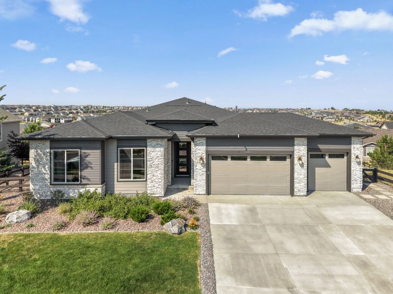 Representative exterior photo of a completed home built from the Ferrara by Pulte Homes in Hilltop at Inspiration, Aurora, CO (Image 21).