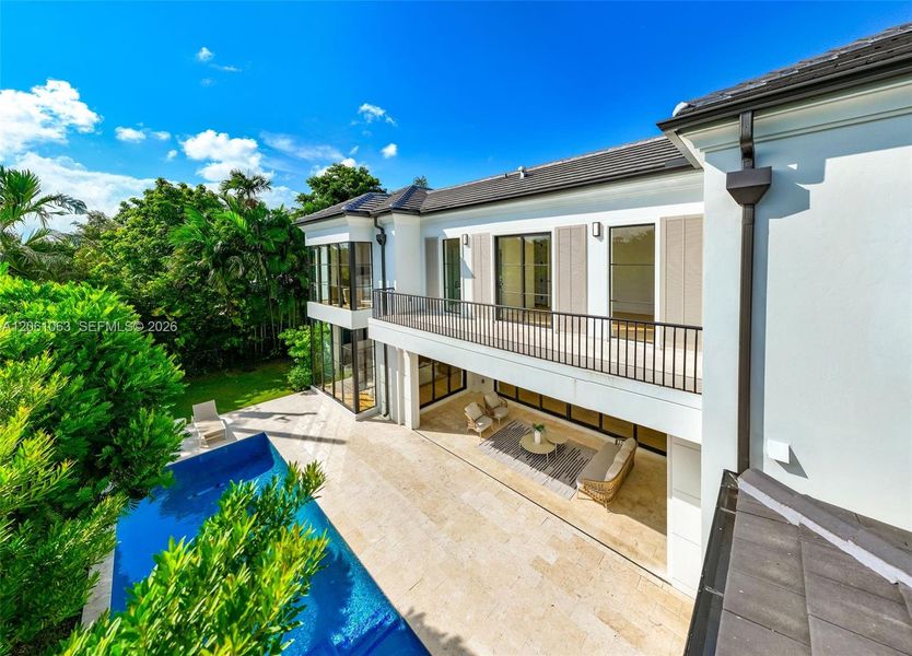 Exterior details and patio area of a home in , Coral Gables (Image 36).