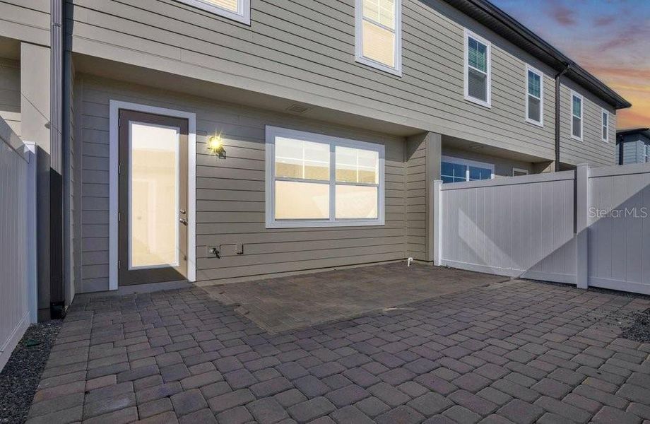 Exterior details and patio area of a home in Northlake at Ovation, Winter Garden (Image 3).