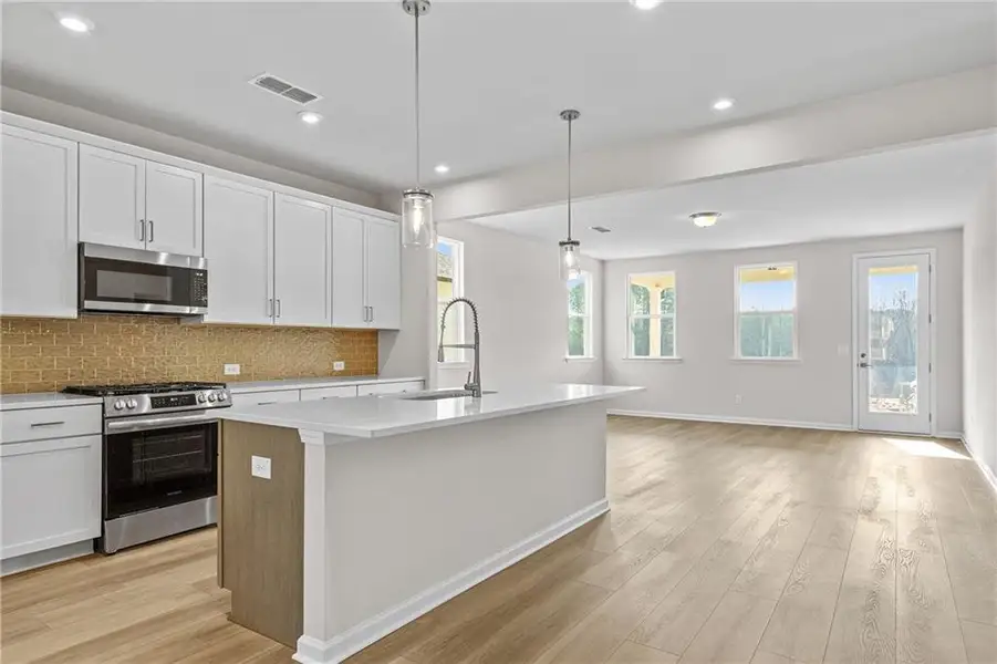 Furnished interior view inside a new home in Kelly Preserve, Loganville (Image 4).