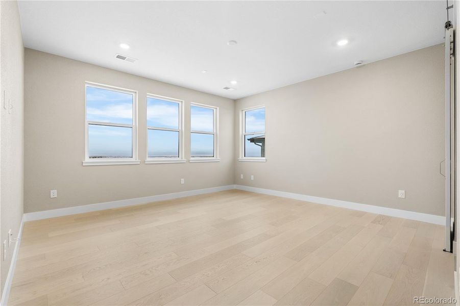 Spacious, unfurnished interior of a new home in Autograph at Lyric, Lone Tree (Image 37).