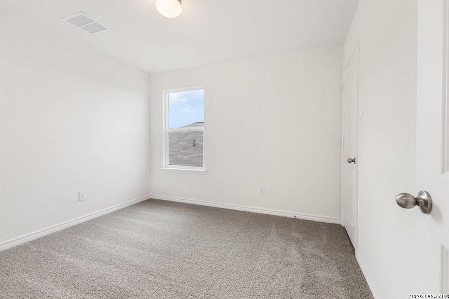 Spacious, unfurnished interior of a new home in Hidden Bluffs at TRP, San Antonio (Image 24).