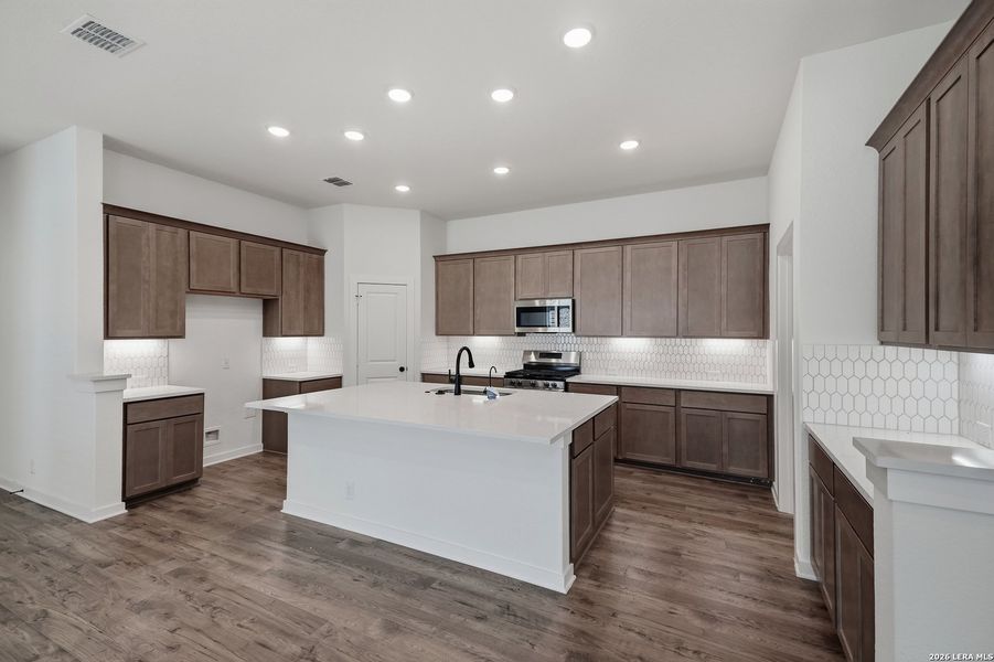 Furnished interior view inside a new home in The Crossvine, Schertz (Image 9).