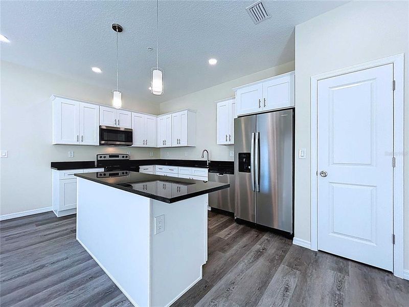 Furnished interior view inside a new home in , Tampa (Image 10). Furnished interior view inside a new home in , Tampa (Image 10).