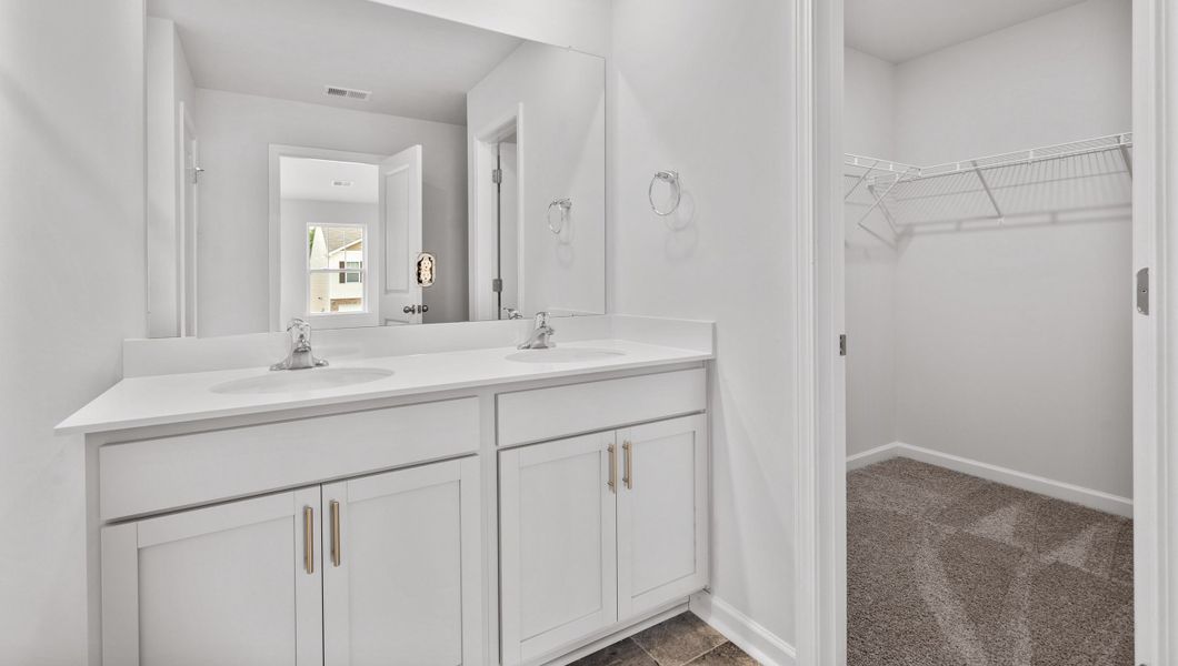 Representative furnished interior of a home built from the Rachel by D.R. Horton in Treemont Commons, Wellford (Image 11).