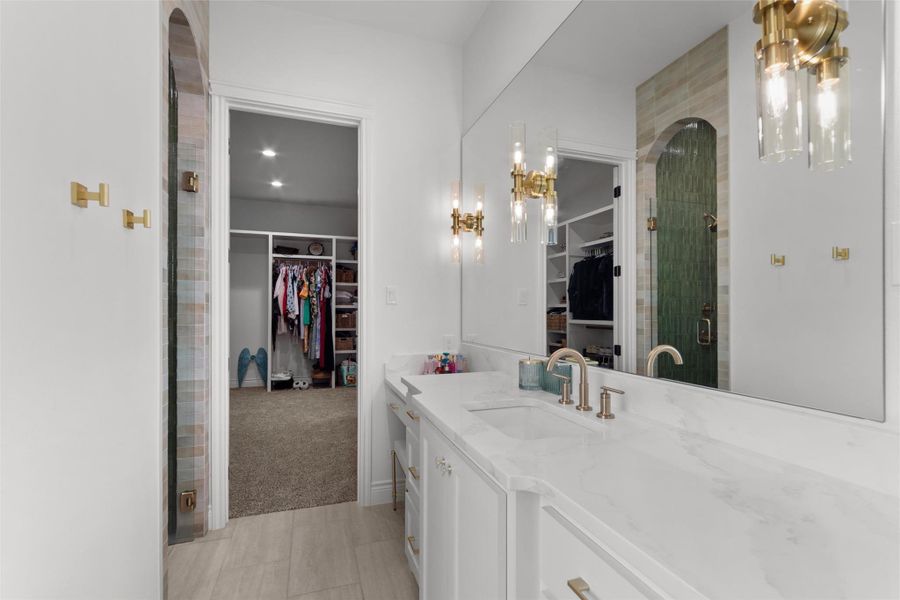 free standing tub/walk-in shower, separate vanities and custom contrasting tile in tub surround and shower. free standing tub/walk-in shower, separate vanities and custom contrasting tile in tub surround and shower.