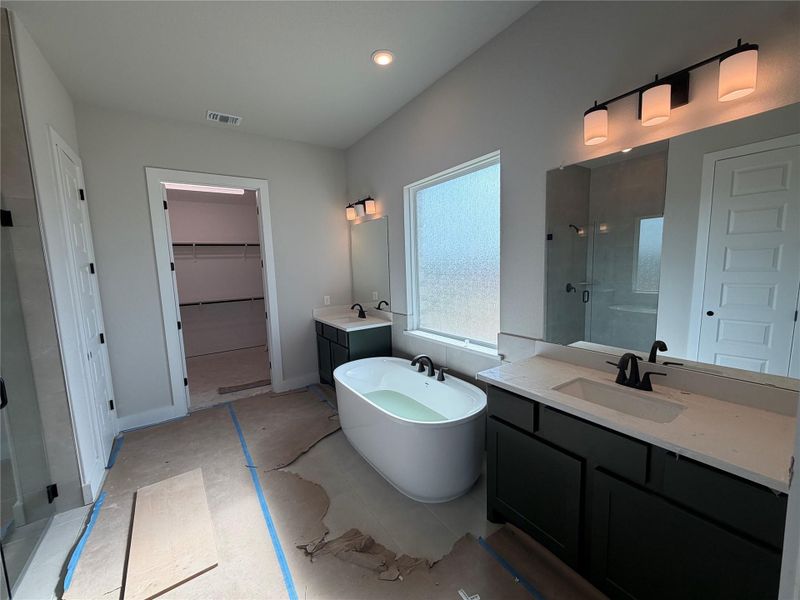 Primary Bath retreat with dual vanities & soaking tub