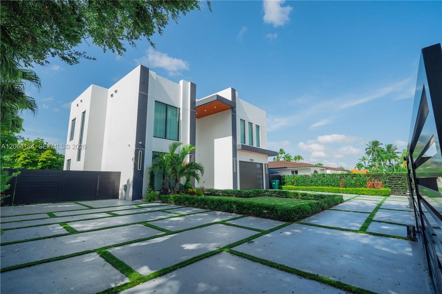 Front exterior of a new home in , Miami, FL, highlighting curb appeal (Image 28). Front exterior of a new home in , Miami, FL, highlighting curb appeal (Image 28).