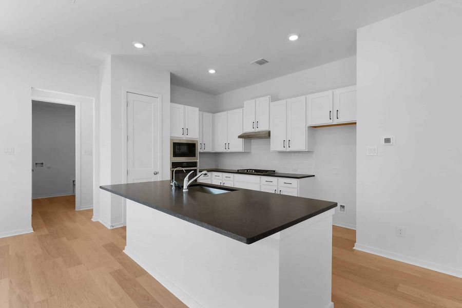 Furnished interior view inside a new home in Highland Village, Georgetown (Image 4).