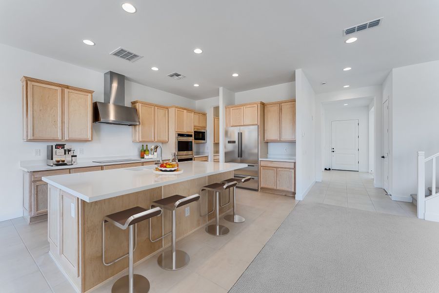 Representative furnished interior of a home built from the Denali by Taylor Morrison in Ellsworth Ranch Voyage Collection, Queen Creek (Image 5).