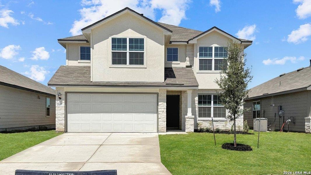 Front exterior of a new home in Riverstone at Westpointe, San Antonio, TX, highlighting curb appeal (Image 1). Front exterior of a new home in Riverstone at Westpointe, San Antonio, TX, highlighting curb appeal (Image 1).