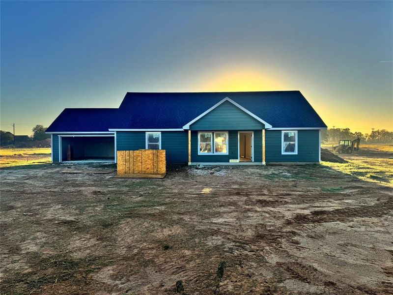 In-progress construction of a new home in , Springtown, TX (Image 1).