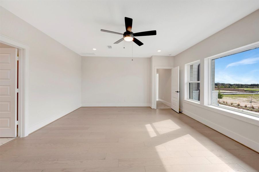 Spacious, unfurnished interior of a new home in Easthaven at Bridgeland Central - Vision Collection, Cypress (Image 16).