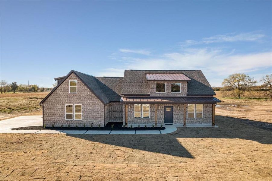 Front exterior of a new home in , Brashear, TX, highlighting curb appeal (Image 27).