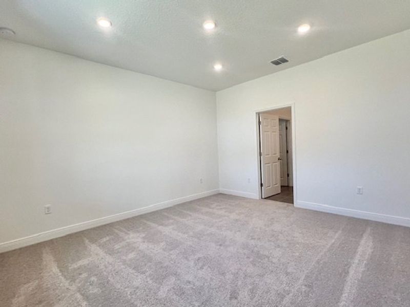 Spacious, unfurnished interior of a new home in Lakes At St Sebastian, Micco (Image 27).