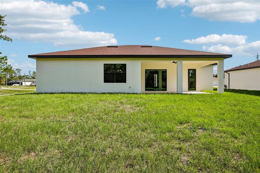 Exterior details and patio area of a home in , North Port (Image 21).