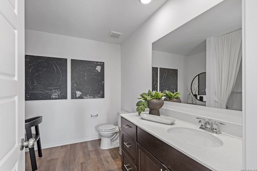 Furnished interior view inside a new home in Cinco Lakes, San Antonio (Image 16).