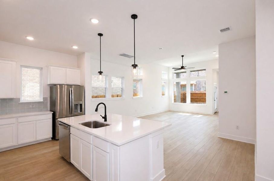 Marshall Salt Flat Kitchen - S Swing (Photo shown is from a completed home with the same floorplan and similar design selections. Actual design selections may very slightly) Marshall Salt Flat Kitchen - S Swing (Photo shown is from a completed home with the same floorplan and similar design selections. Actual design selections may very slightly)