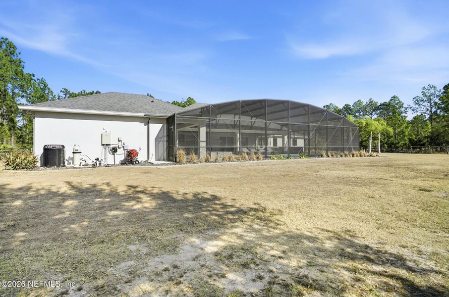 Exterior details and patio area of a home in , Palm Coast (Image 30). Exterior details and patio area of a home in , Palm Coast (Image 30).