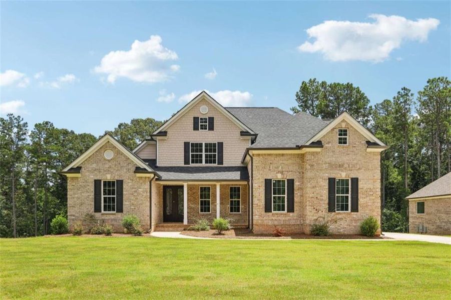 Front exterior of a new home in Whitestone, Douglasville, GA, highlighting curb appeal (Image 14).