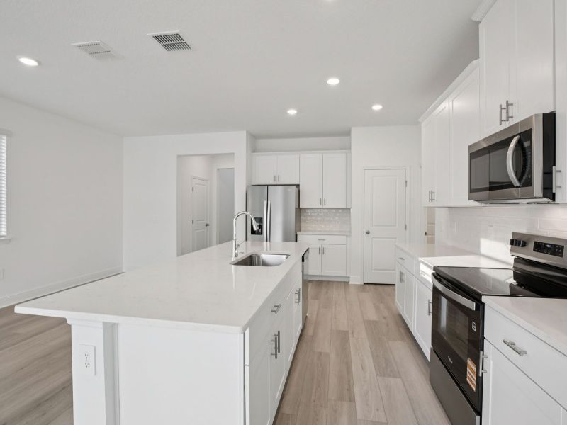 Furnished interior view inside a new home in Cyrene at Minneola - Villas, Minneola (Image 5). Furnished interior view inside a new home in Cyrene at Minneola - Villas, Minneola (Image 5).