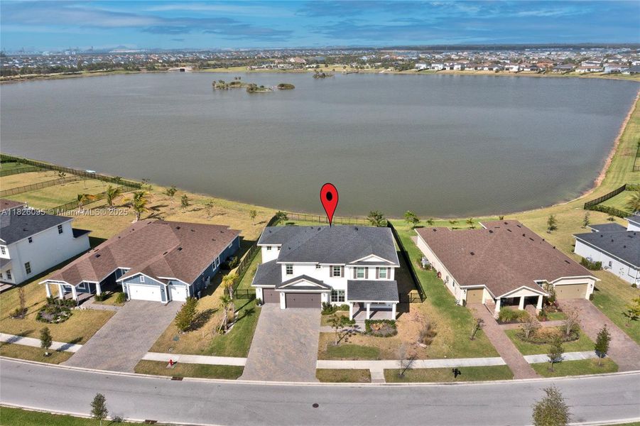 Front exterior of a new home in Arden: The Waterford Collection, Loxahatchee, FL, highlighting curb appeal (Image 26).
