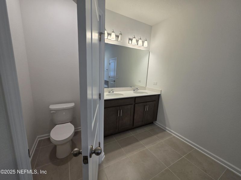 Furnished interior view inside a new home in Hyland Trail, Green Cove Springs (Image 13).