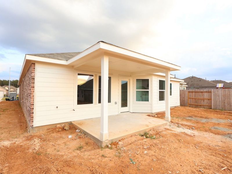 Exterior details and patio area of a home in Magnolia Ridge, Magnolia (Image 3).