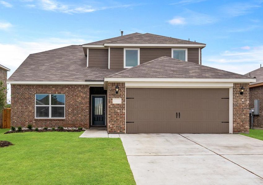 The Cypress is a beautiful two-story, brick home with siding details.