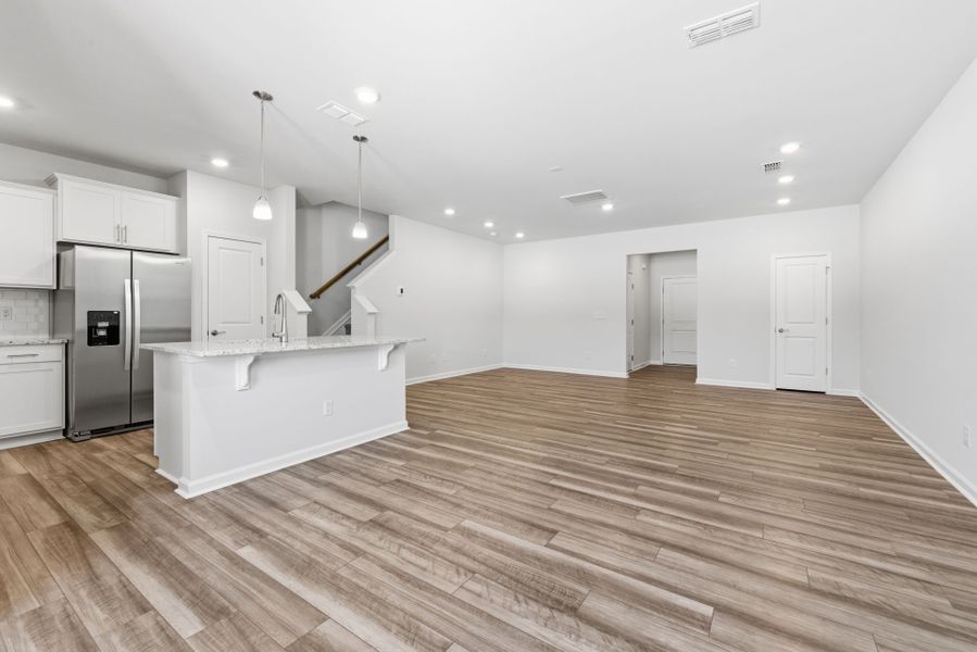 Spacious, unfurnished interior of a new home in Poets Walk, Whitsett (Image 18).