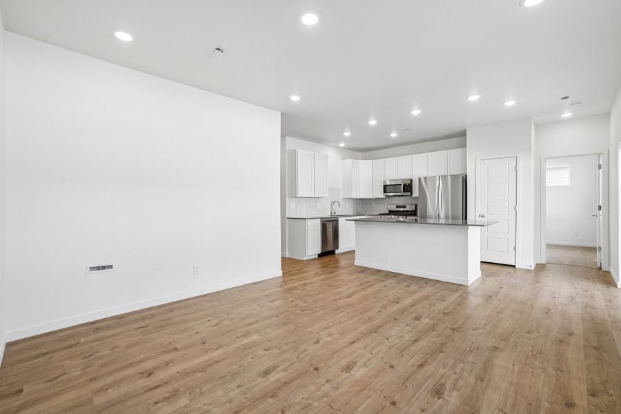 Spacious, unfurnished interior of a new home in Union Colony West, Greeley (Image 34).