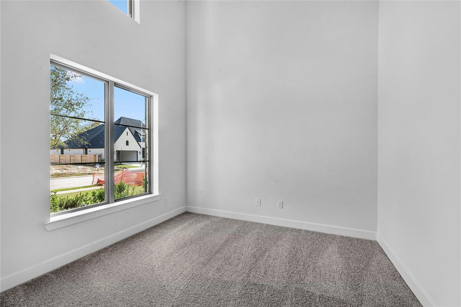 Spacious, unfurnished interior of a new home in Sienna, Missouri City (Image 17).