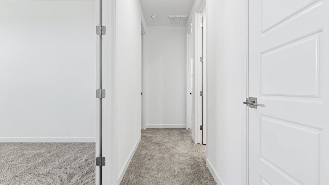 Representative unfurnished interior of a home built from the Phoenician by D.R. Horton in The Ridge at Stone Butte, Phoenix (Image 38). Representative unfurnished interior of a home built from the Phoenician by D.R. Horton in The Ridge at Stone Butte, Phoenix (Image 38).