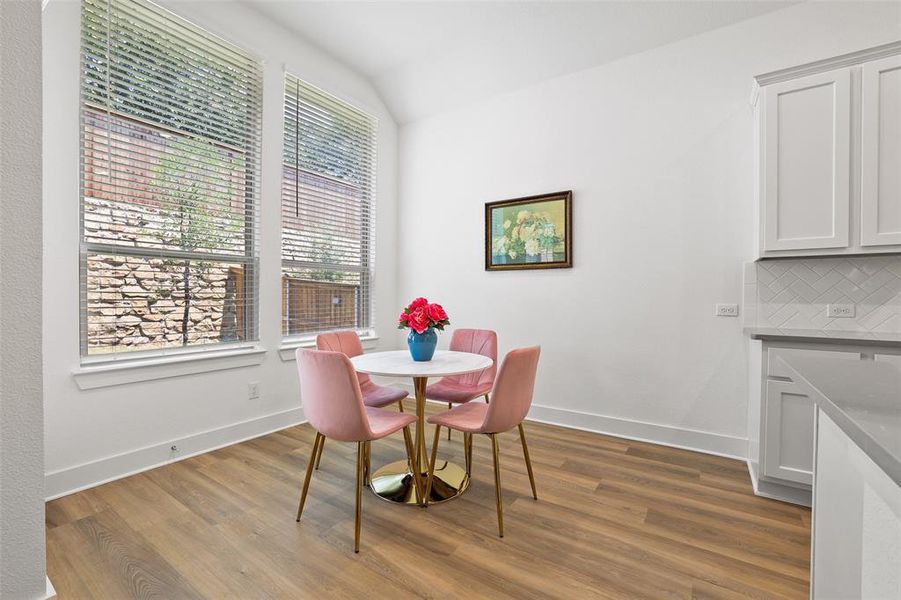 Large windows fill the kitchen and breakfast area with light Large windows fill the kitchen and breakfast area with light