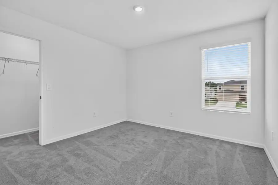 Representative unfurnished interior of a home built from the Kingfisher by Taylor Morrison in Palm Wind, Hudson (Image 19).