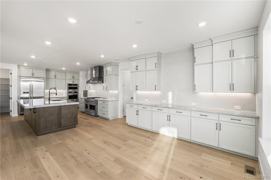 Furnished interior view inside a new home in Luxe at The Canyons, Castle Pines (Image 10).
