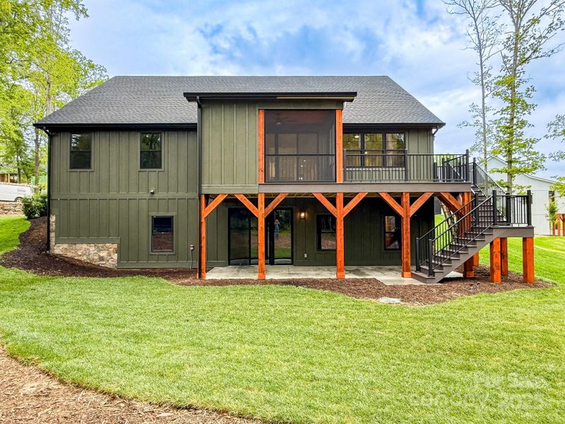 Exterior details and patio area of a home in , Mills River (Image 27).