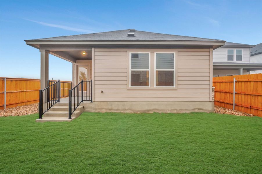 Exterior details and patio area of a home in Heritage, Dripping Springs (Image 15).