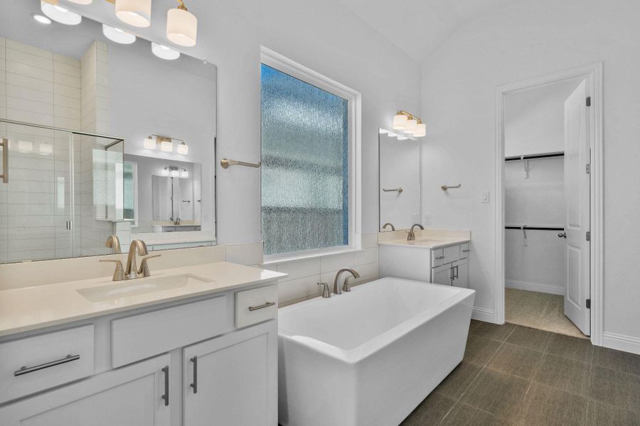 Primary Bath retreat with dual vanities & soaking tub
