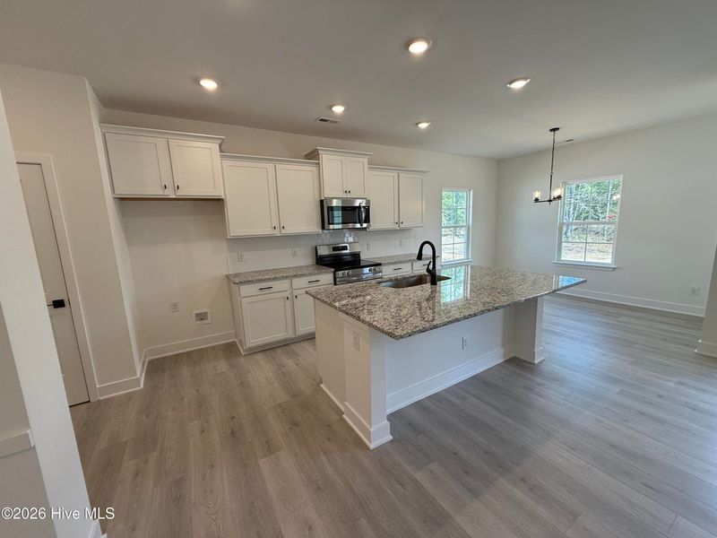 Furnished interior view inside a new home in Wood Creek Landing, Leland (Image 6). Furnished interior view inside a new home in Wood Creek Landing, Leland (Image 6).