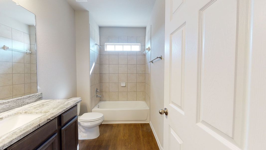 Representative furnished interior of a home built from the Floor Plan 3256 by Colina Homes in Grand Magnolia, Magnolia (Image 17).