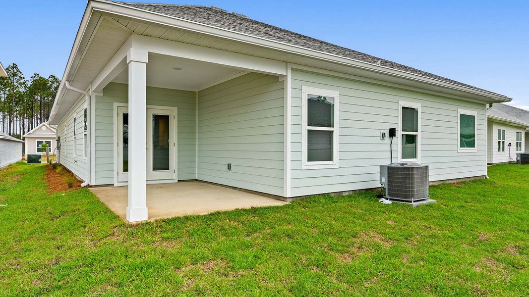 Exterior details and patio area of a home in Bayside at Ward Creek, Panama City Beach (Image 3).