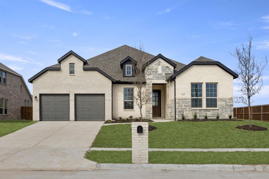 Representative exterior photo of a completed home built from the Belton by UnionMain Homes in Lake Breeze, Lavon, TX (Image 18).