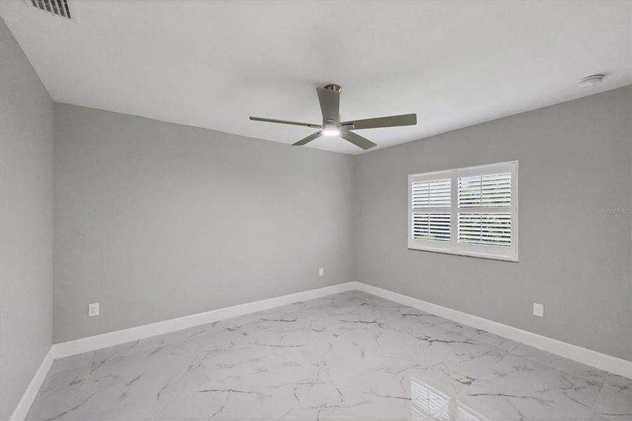 Spacious, unfurnished interior of a new home in , Port Charlotte (Image 18).