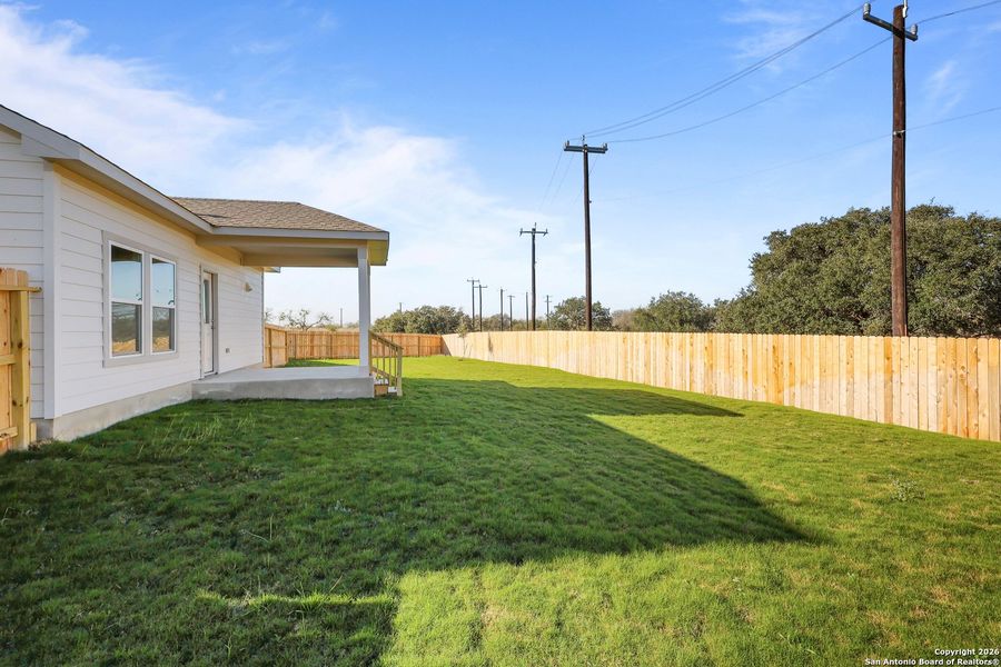 Exterior details and patio area of a home in Garden Grove, Schertz (Image 21).